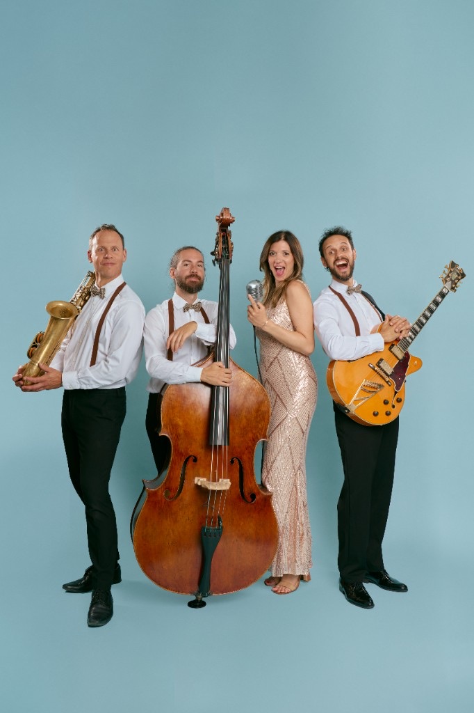 The Jazz Silhouettes four-piece with saxophone in daylight attire